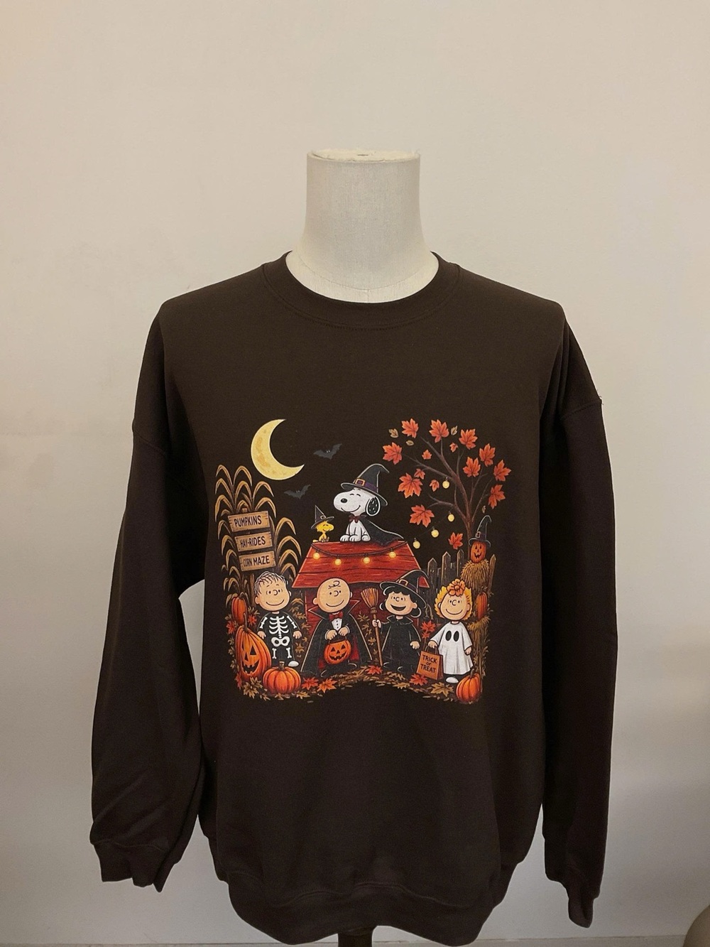 Brown Crewneck Sweatshirt with Orange & Cream Halloween Peanuts Graphic